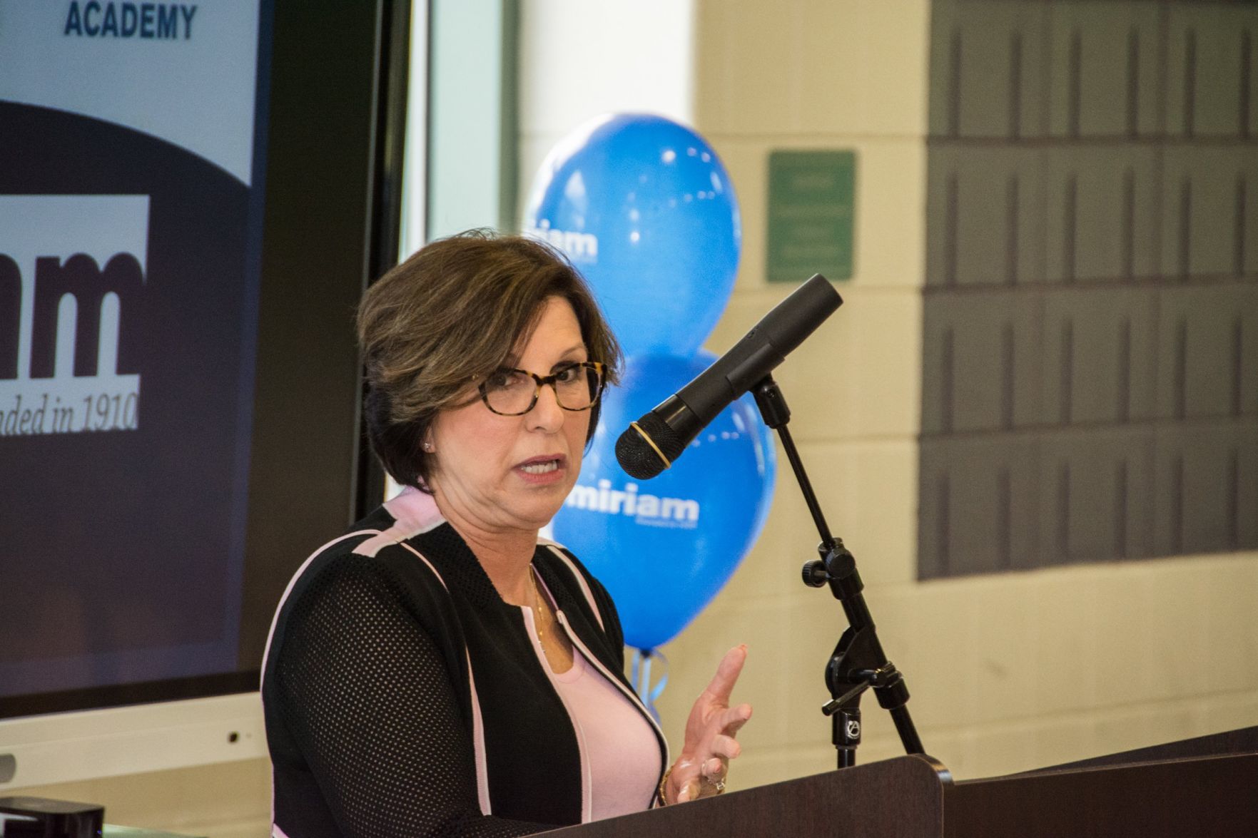 Amye Carrigan speaks at the Friends of Miriam Luncheon